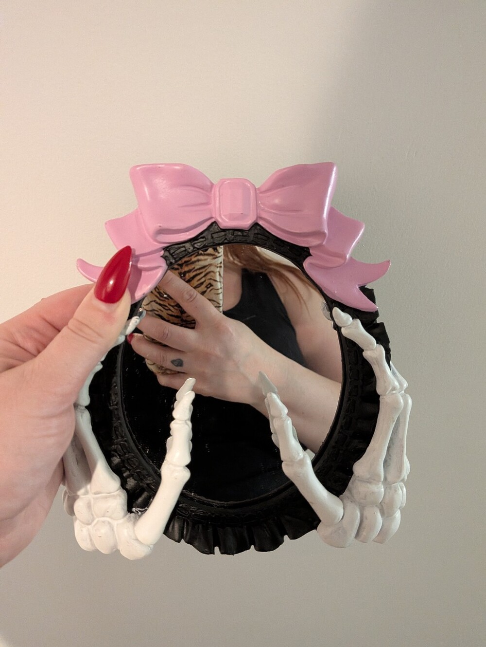 Skeleton Hand And Bow Mirror